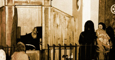 Padre Pio in a Confessional booth