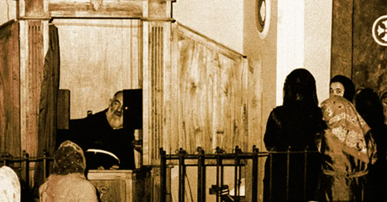 Padre Pio in a Confessional booth